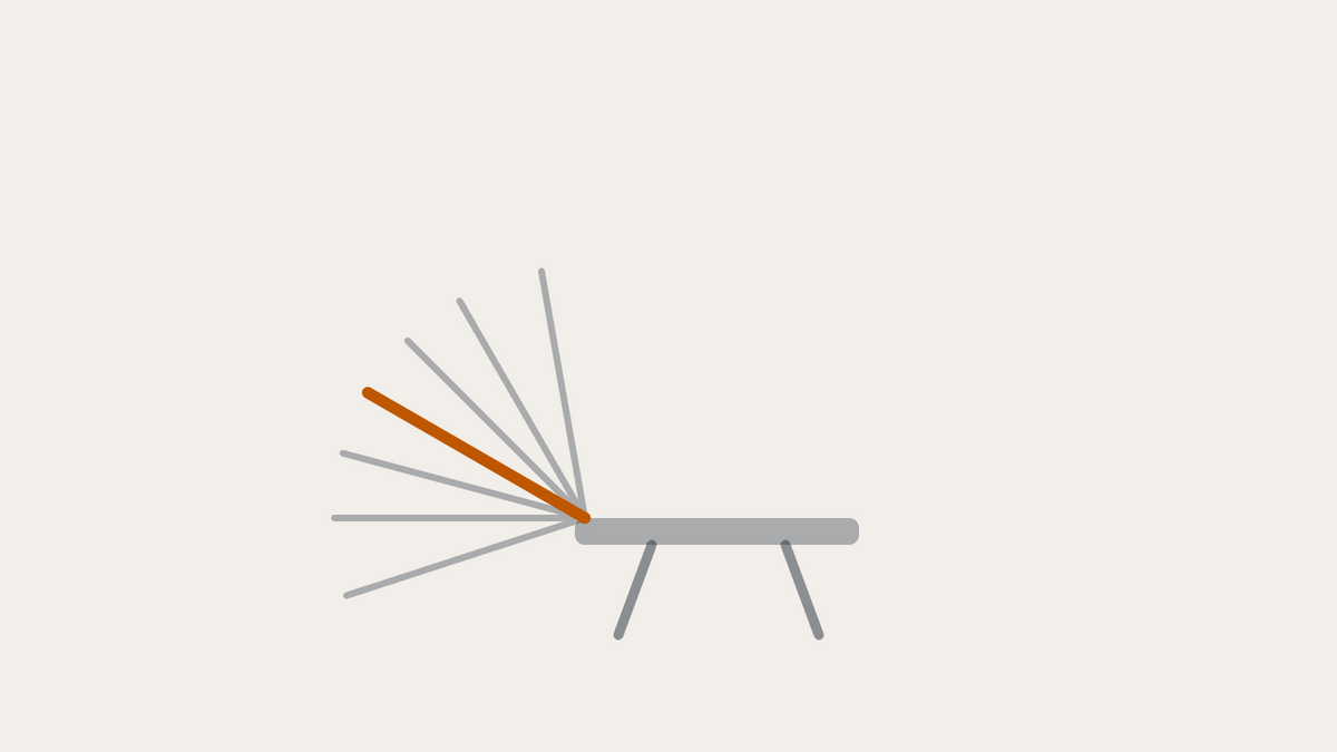 Illustration of an adjustable weight bench set to an incline angle