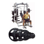 Body-Solid Series 7 Smith system with FID bench and 255 lb rubber Olympic set