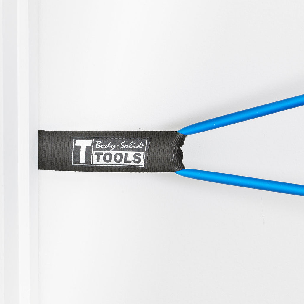 Resistance tube door attachment in use