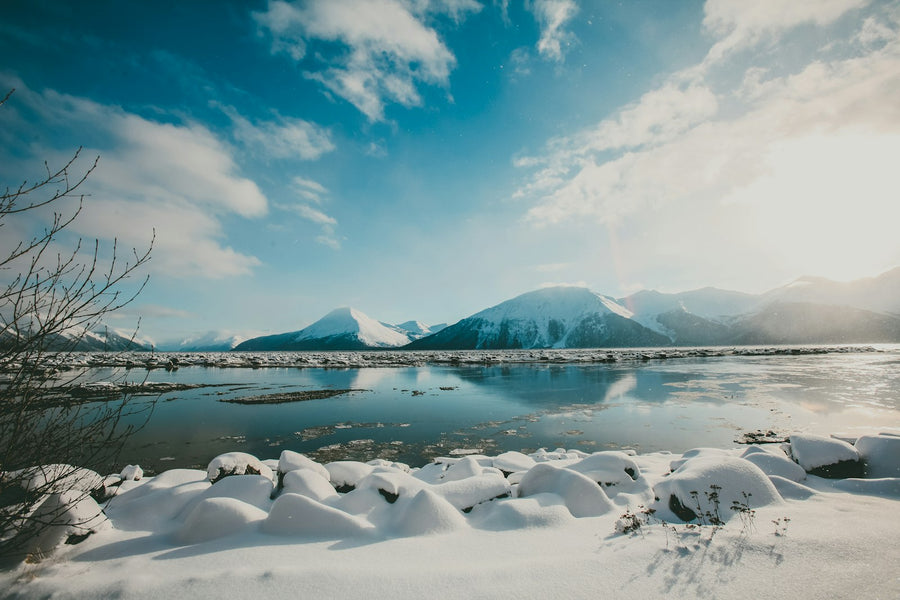 Snow-capped mountains reflected in a lake, Southcentral Alaska